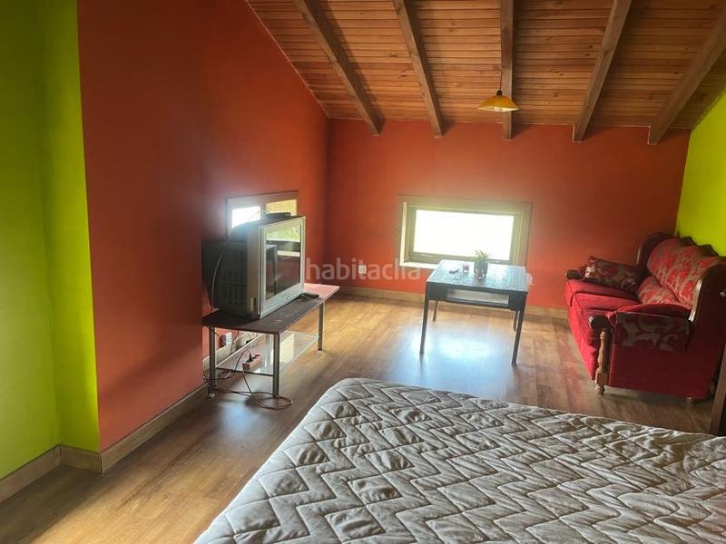 Foto c15c8c37-e1f2-429b-9bf3-899c6dd14587. Casa con camino riscaldamento in Castrelo de Miño