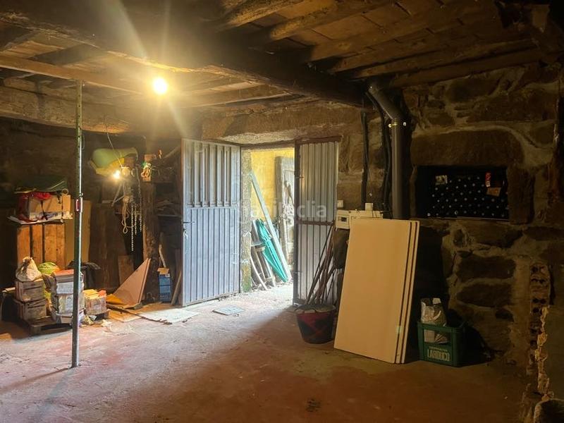 Foto c28c25fe-0478-44ff-9f1f-c850aeb16be9. Casa con camino riscaldamento in Castrelo de Miño