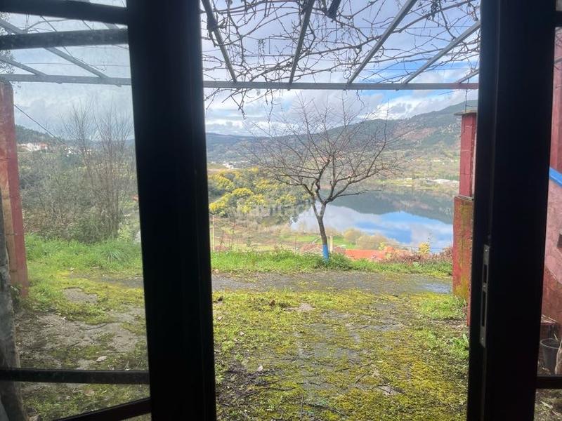 Foto ed6c6e76-f9c7-4acb-b016-5bcac52ba1e2. Casa con camino riscaldamento in Castrelo de Miño