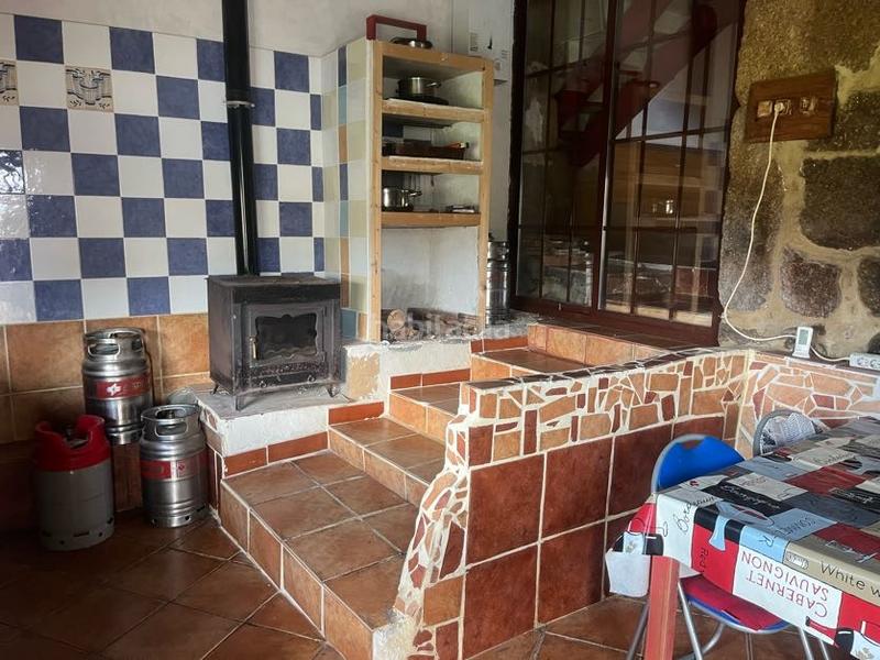 Foto f531e7ee-2dc6-4cc7-8a15-cf523a55bc98. Casa con camino riscaldamento in Castrelo de Miño