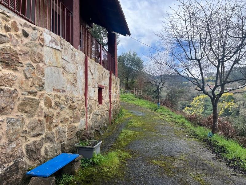 Foto f86f2b57-4a80-4030-90f4-9206daae4f51. Casa con camino riscaldamento in Castrelo de Miño