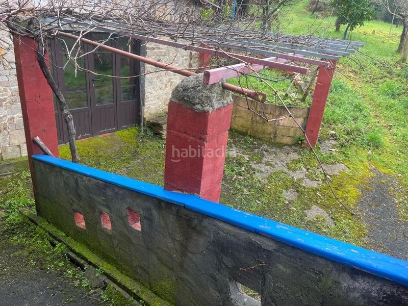 Foto f873955b-45b0-4e31-ab46-14635f873e40. Casa con camino riscaldamento in Castrelo de Miño