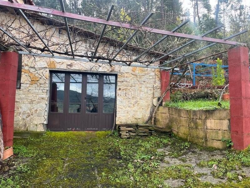 Foto fad78229-8c4e-42e2-98ec-9338d215678e. Casa con camino riscaldamento in Castrelo de Miño