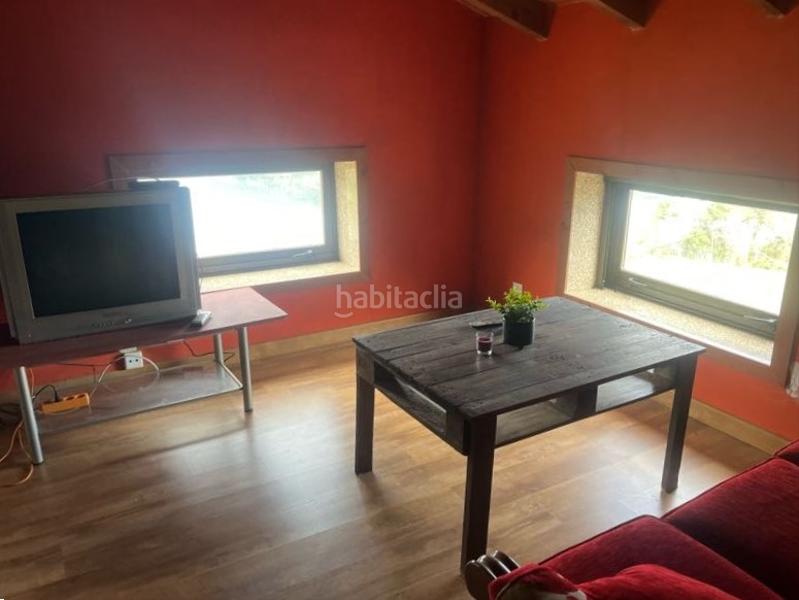 Foto fbe9e5f7-43ae-4588-a255-54cdcf8a7367. Casa con camino riscaldamento in Castrelo de Miño