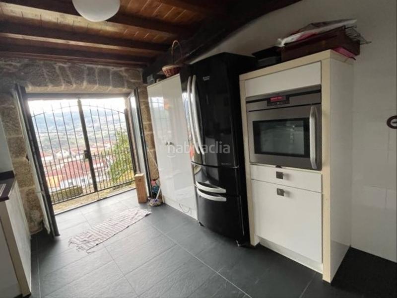 Foto 4f947198-94fb-4c5f-aba1-55499d0ebb78. Casa adossada a Beade