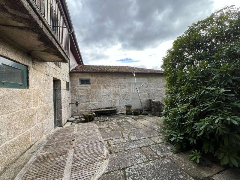 Foto a1b925dc-076c-46e0-b737-3dcc5c3c40fc. Casa adossada a Beade