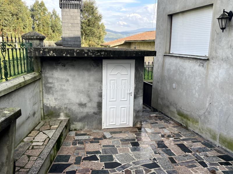 Foto c7ccb8db-c148-44ce-806e-fb9981f4e699. Chalet amplia casa en as neves en Neves (As)