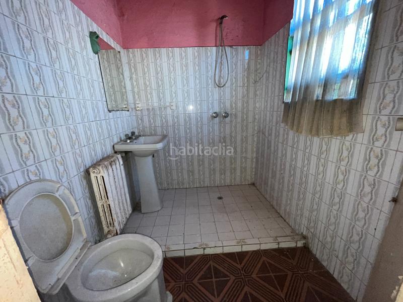 Foto 1393ab54-f82b-4f12-9e30-da8eac270717. Casa adossada a Leiro