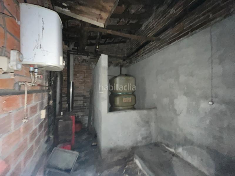 Foto 156ce69d-0ec2-4e23-b37c-60531d1e0991. Casa adossada a Leiro