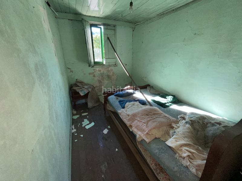 Foto 52671b9d-3d70-4f62-a42c-388dac22ec31. Casa adossada a Leiro