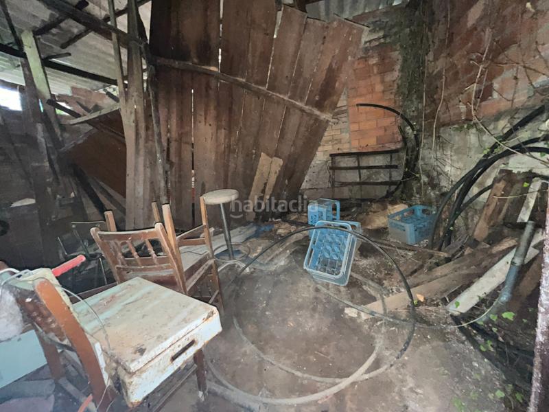 Foto c2393c21-bc12-481c-accc-c5b3e61ef37b. Casa adossada a Leiro