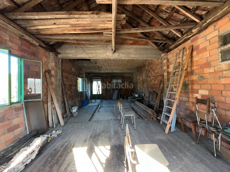 Foto e95a288f-a54a-4da1-b91b-74b88d7bdfc4. Casa adossada a Leiro