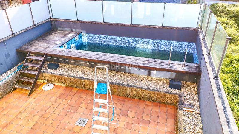 Foto 72d4ce13-554a-4ffd-8209-caf26c460c9f. Casa pareada chalet pareado con piscina y ascensor en el centro en Gondomar