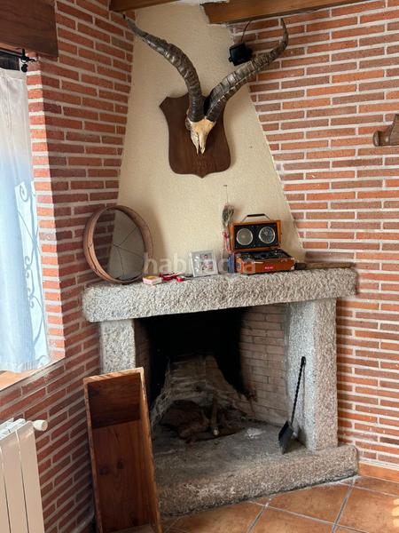 Foto 876cfe6e-ffbc-43bd-84b5-71a31febfe21. Casa aparellada amb xemeneia calefacció aparcament a Ávila