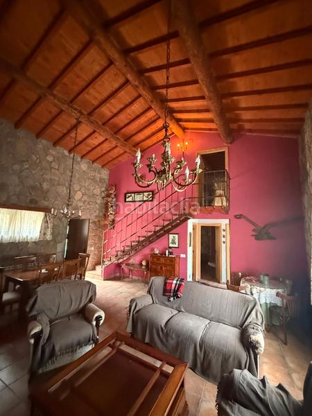 Foto 8ffb8672-145f-46bb-9d46-fce96343ed1c. Casa aparellada amb xemeneia calefacció a Torre (La)