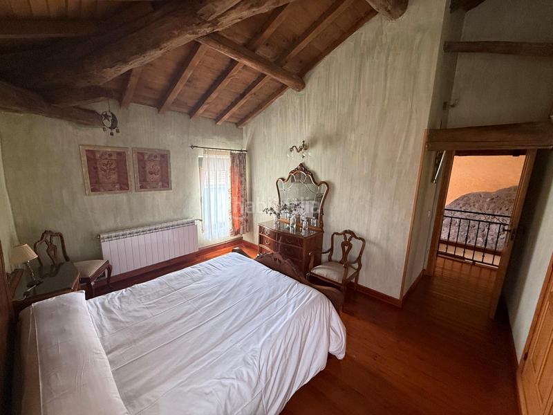 Foto c6f8612f-3bf0-42f8-bce1-addd5ddb6d20. Casa aparellada amb xemeneia calefacció a Torre (La)