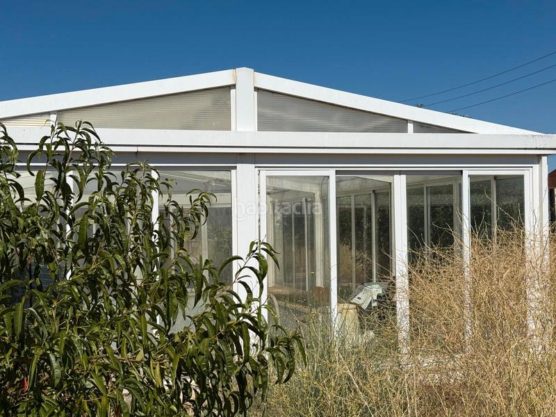 Foto 495c2271-8360-46e3-a415-ee9eda363204. Chalet  con parcela y naves en la torre en Torre (La)