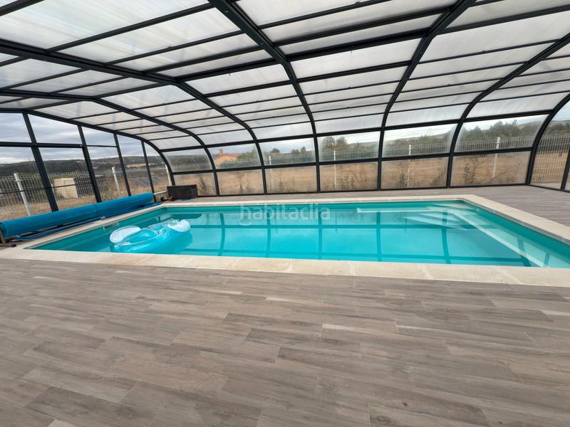 Foto fc0d7a39-80d3-4d92-a530-e688f8f2d34b. Maison avec cheminée dans Zona Rural Ávila