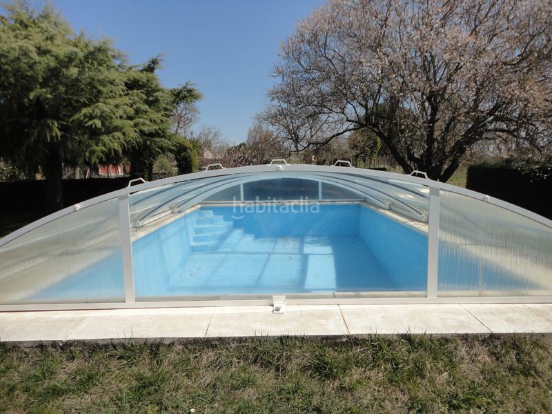 Foto 48793f7a-1f34-4f78-9269-4f4e128705ea. Xalet amb xemeneia calefacció aparcament piscina a Laguna de Duero