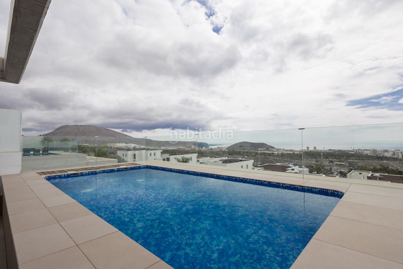 Foto 1a702532-54a3-4631-a404-c31d6a9dd77f. Casa adossada amb aparcament piscina a La Caldera Adeje