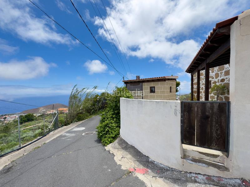 Foto 1e6f9887-615d-43d3-80c9-eb6cf791344f. Masía venta de casa y terreno calle morras vistas en Fasnia