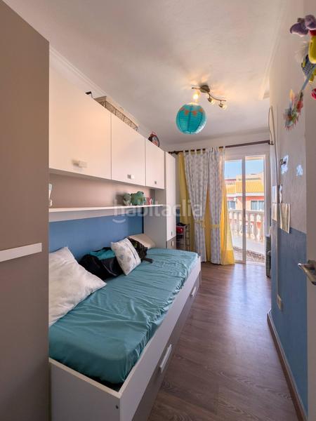 Foto c266dffb-90dd-47f8-a9ca-1fe64bfcd617. Casa adossada amb aparcament a Arico