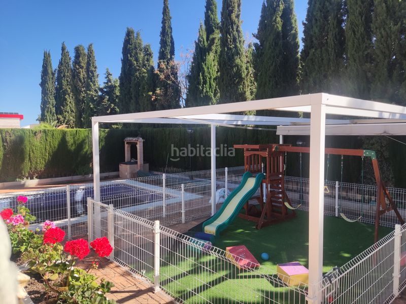 Foto dbd94cc4-1a5c-4ff0-afb3-93adadb0ffb8. Casa amb xemeneia calefacció aparcament piscina a Ciudad Real