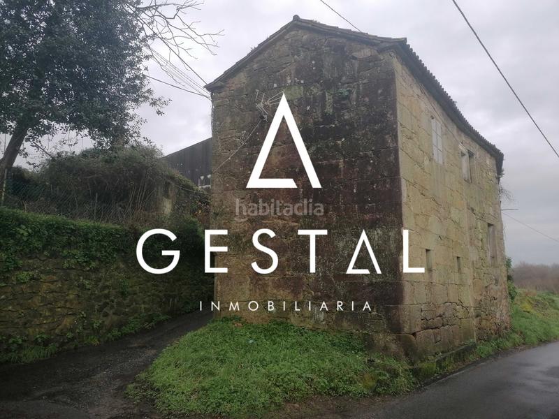 Foto ccf879d8-a240-427a-9300-b5c5c38de03a. Casa en aldea extramundi de abaixo 214 2 casas con finca para reformar en Padrón