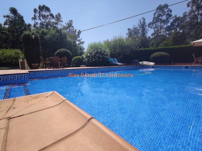 Foto 3c3dc9e6-6e09-4708-9c88-c72d29a252c5. Casa ref 2914 chalet 5 dorm. con jardín y piscina muy próximo mondariz balneario en Ponteareas