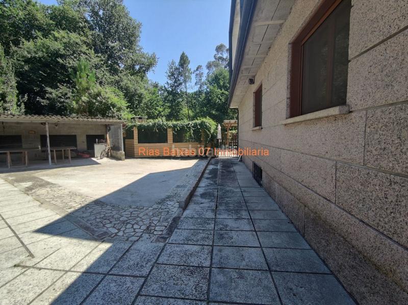 Foto 5c88dd9d-a3fa-4fd3-ad16-227419a59a8c. Casa ref 2914 chalet 5 dorm. con jardín y piscina muy próximo mondariz balneario en Ponteareas