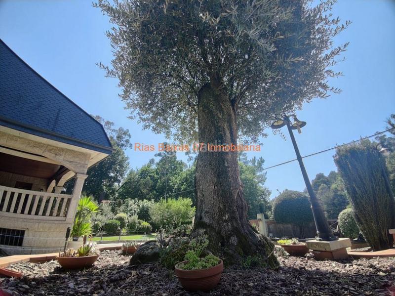Foto 753c35bd-3ea8-4eff-8713-743c8d7aeeb2. Casa ref 2914 chalet 5 dorm. con jardín y piscina muy próximo mondariz balneario en Ponteareas