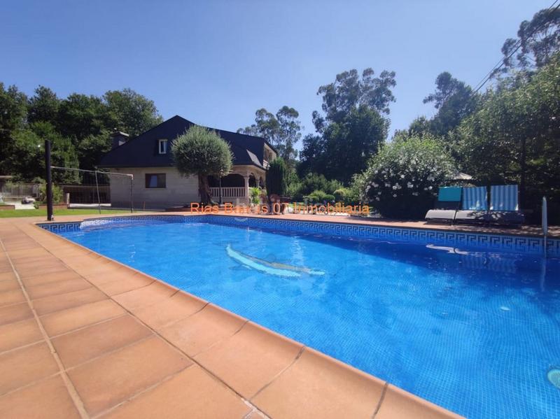 Foto d4e2cb54-a036-4e9c-86b8-6f8db15dff53. Casa ref 2914 chalet 5 dorm. con jardín y piscina muy próximo mondariz balneario en Ponteareas