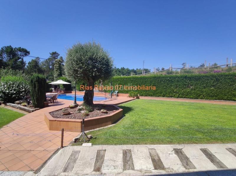 Foto fc252c58-0063-4fc3-9ffc-c8aeebe06427. Casa ref 2914 chalet 5 dorm. con jardín y piscina muy próximo mondariz balneario en Ponteareas