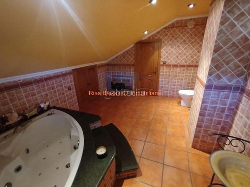 Foto 02924af0-8477-462f-8eb0-19274b072eb1. Casa ref 7004 chalet 4 dorm. con piscina y vistas al mar en Redondela