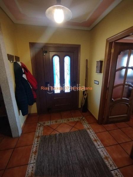 Foto 072e6aae-77f2-49f1-93c8-54d0c4c46c4b. Casa ref 7004 chalet 4 dorm. con piscina y vistas al mar en Redondela