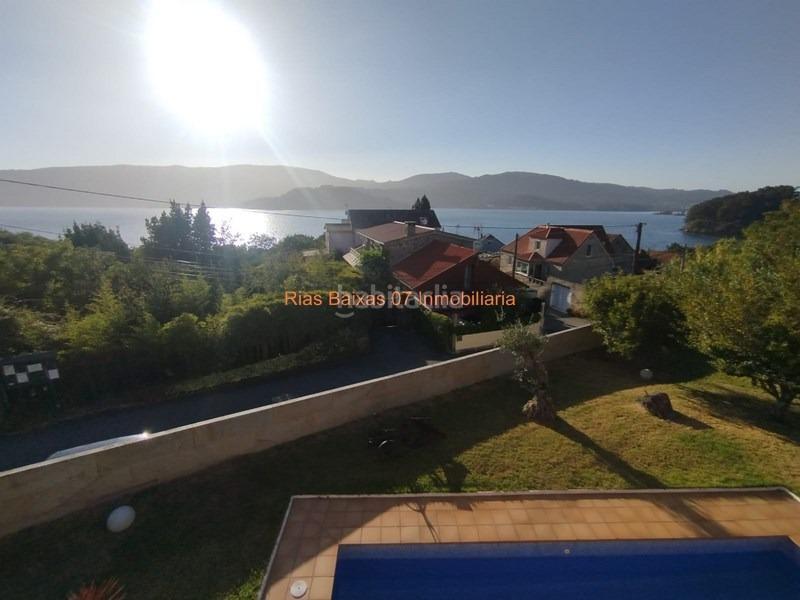 Foto 3bd27521-1ba9-4dd3-a90e-53bb3940a906. Casa ref 7004 chalet 4 dorm. con piscina y vistas al mar en Redondela