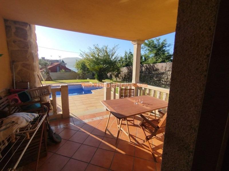 Foto 3c6ac760-e7c1-41f0-b301-0bf1a0e93d78. Casa ref 7004 chalet 4 dorm. con piscina y vistas al mar en Redondela