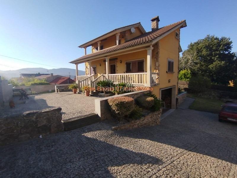 Foto 4c61c6f4-ce8f-4e30-a29e-6443e57283a5. Casa ref 7004 chalet 4 dorm. con piscina y vistas al mar en Redondela