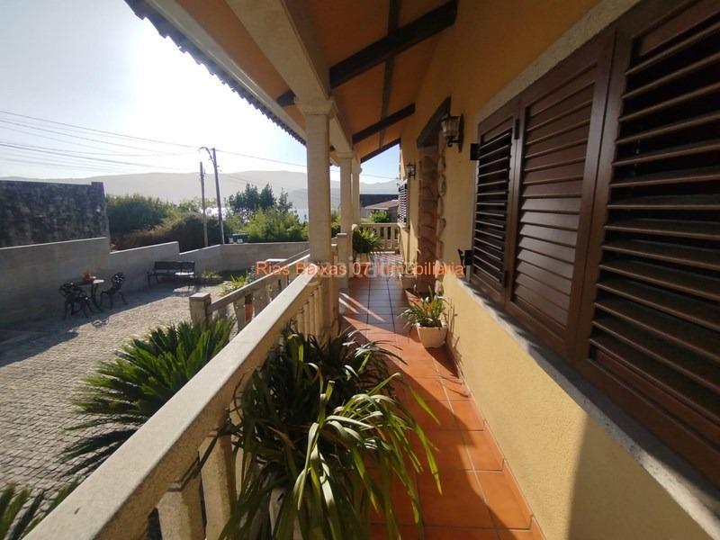 Foto 751552c7-0e8e-4421-94b9-d52f95e659ce. Casa ref 7004 chalet 4 dorm. con piscina y vistas al mar en Redondela