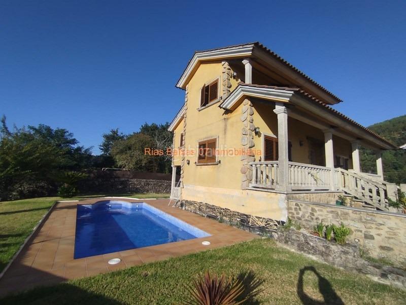Foto 8a90084e-2bcf-4f7f-a8cf-da483c812f84. Casa ref 7004 chalet 4 dorm. con piscina y vistas al mar en Redondela