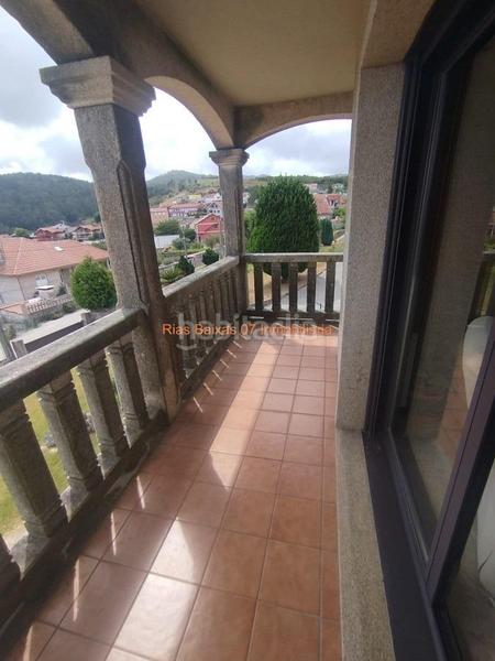Foto b5272676-a57f-4846-a22d-034d49449a45. Casa ref 7005 chalet de piedra 6 dorm. con vistas despejadas zona alta mos mos en Vigo