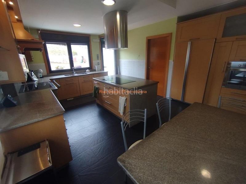 Foto dbe7eac9-522d-4dc7-9e4d-5409b9a68bbe. Casa ref 7005 chalet de piedra 6 dorm. con vistas despejadas zona alta mos mos en Vigo