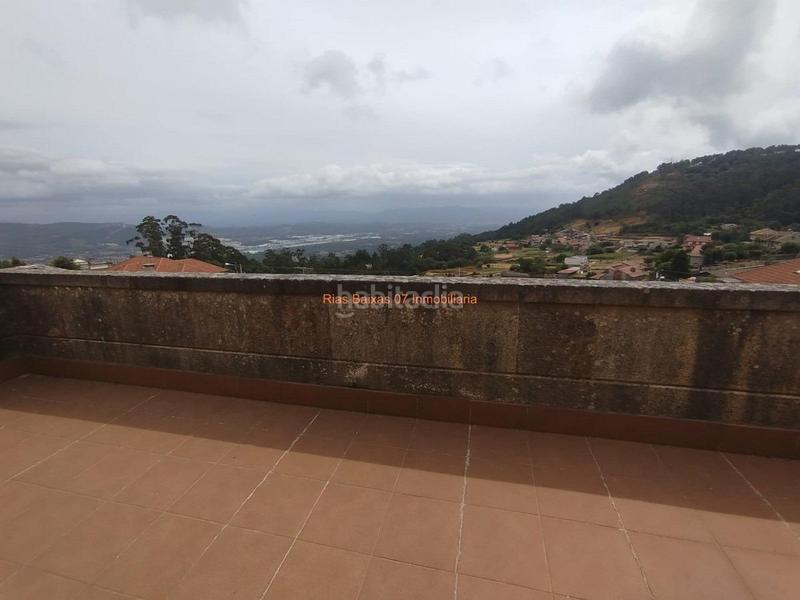 Foto e66f87a4-f899-4dbf-8b23-680c24e012e3. Casa ref 7005 chalet de piedra 6 dorm. con vistas despejadas zona alta mos mos en Vigo