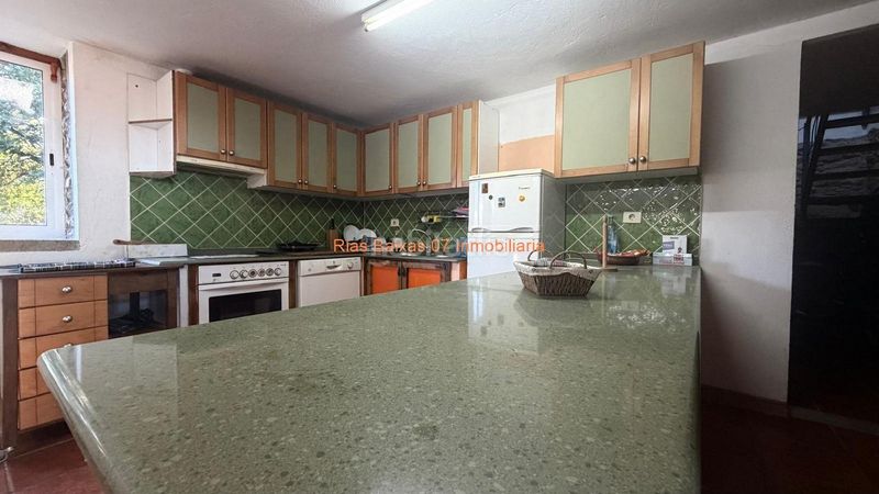 Foto 475a2f6b-e983-4e53-b1f5-26bf351de4c9. Casa amb calefacció aparcament a Tui