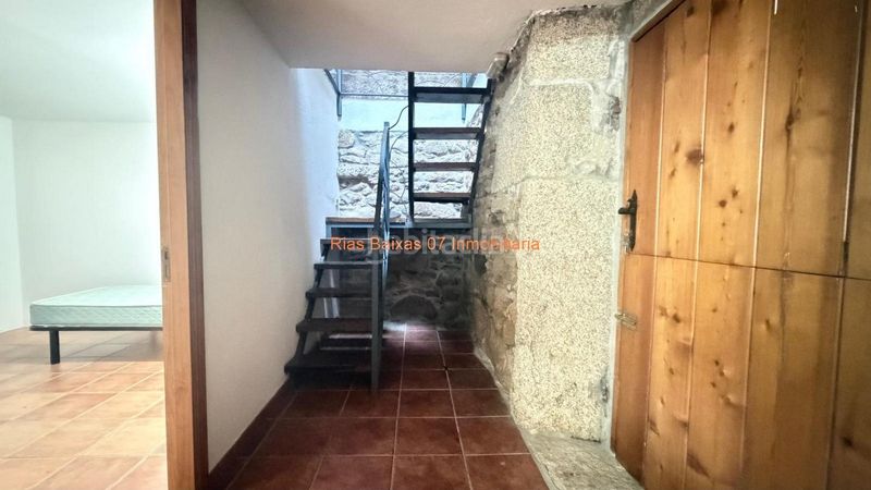 Foto 8a6da552-d456-4306-b8d7-5f6f8a0e1342. Casa amb calefacció aparcament a Tui