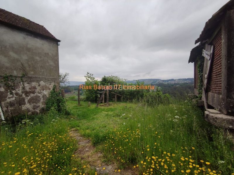 Foto f7cf4eb6-eb40-4b8b-8caf-c7489269db6e. Casa amb aparcament a Mos