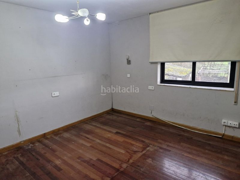 Foto 3bc75c32-f760-4d2b-bf6a-609769dcf3d5. Casa amb aparcament a Carracedelo