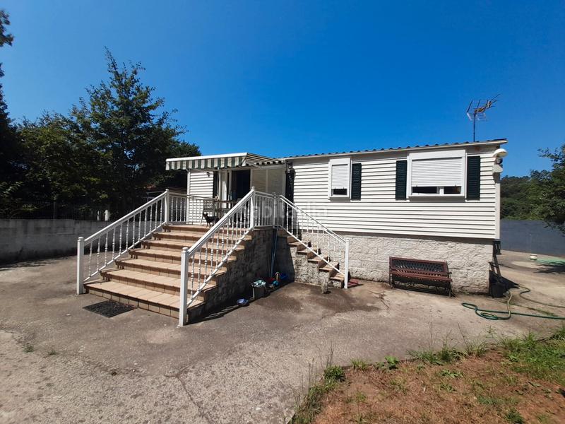 Foto 160b477a-a106-4b49-ac03-4a745060249a. Casa  prefabricada, 2 dormitorios, amueblada, con luz, agua y calefacción. parcela cerrada con portal automático. en Ponteareas