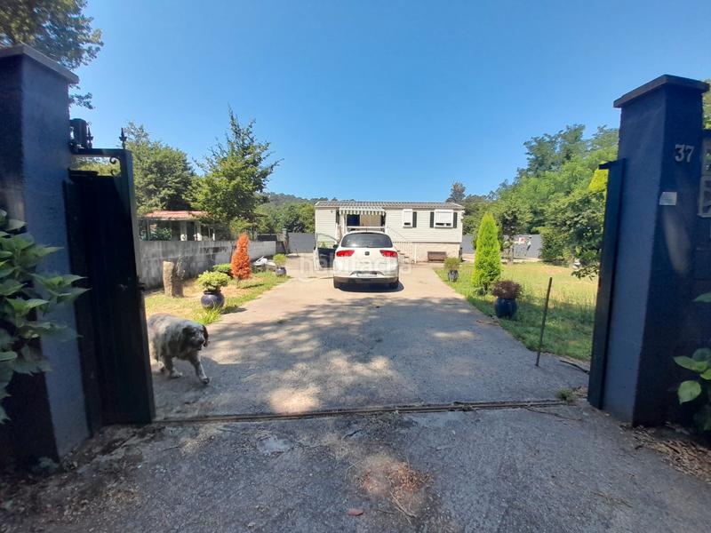 Foto 3b7f7281-f52e-4937-b16d-2dc6eda7de08. Casa  prefabricada, 2 dormitorios, amueblada, con luz, agua y calefacción. parcela cerrada con portal automático. en Ponteareas