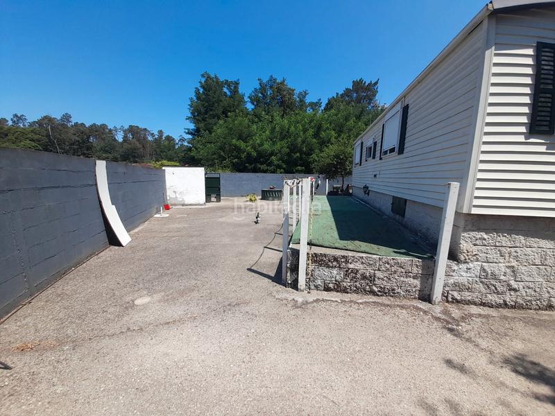 Foto 6fba0046-65b6-486f-a9b3-eee334ebbb9e. Casa  prefabricada, 2 dormitorios, amueblada, con luz, agua y calefacción. parcela cerrada con portal automático. en Ponteareas